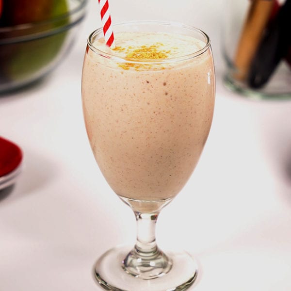 SlimFast Advanced Gingersnap Smoothie in a stemmed glass.