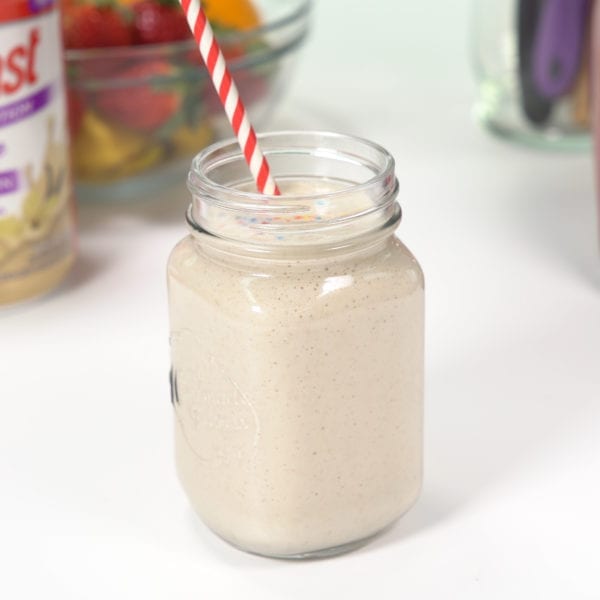 Frosted Sugar Cookie Smoothie in a mason jar glass.