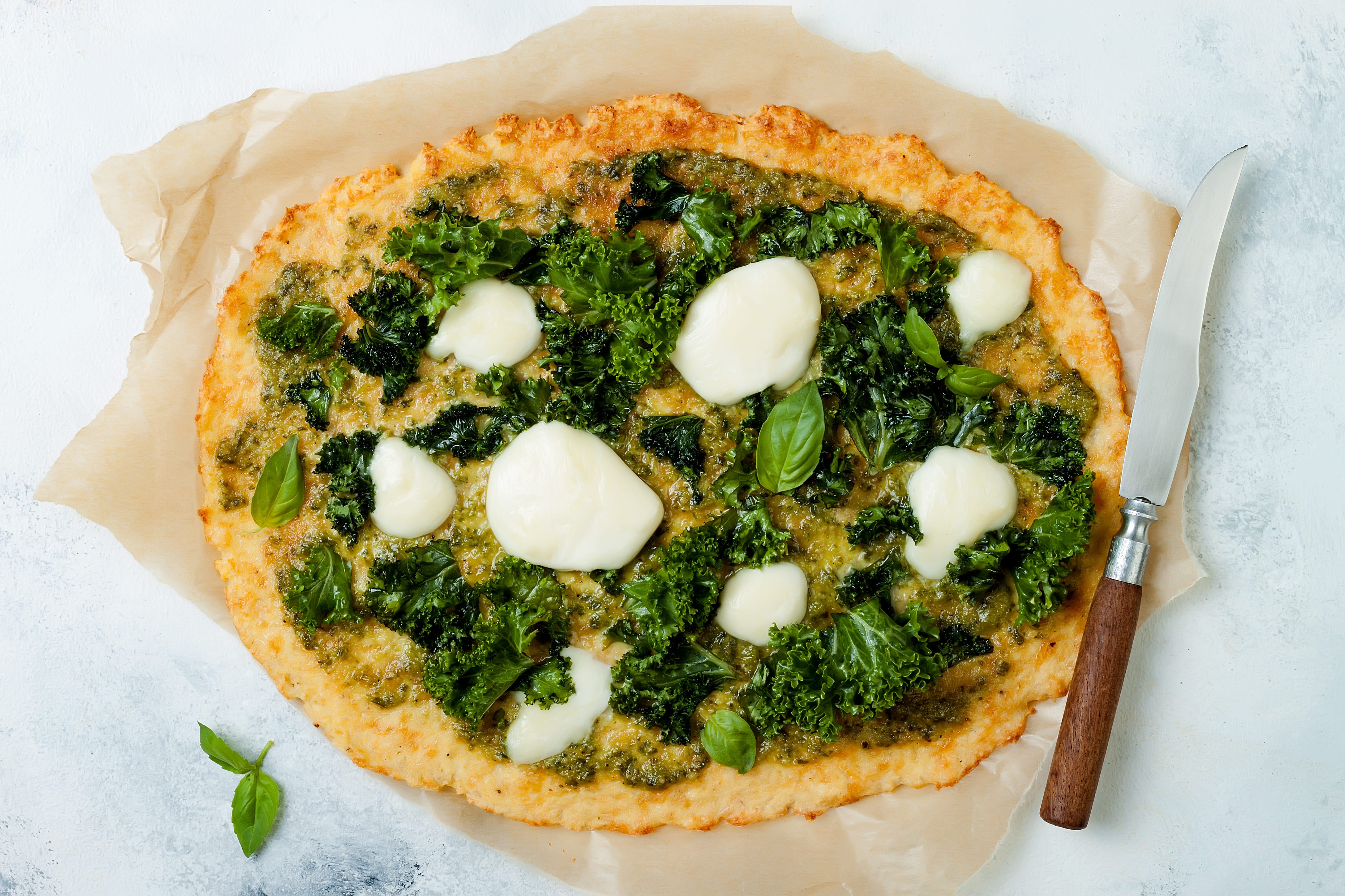 Spinach, Kale, and Mozzarella Cauliflower Pizza Recipe | SlimFast