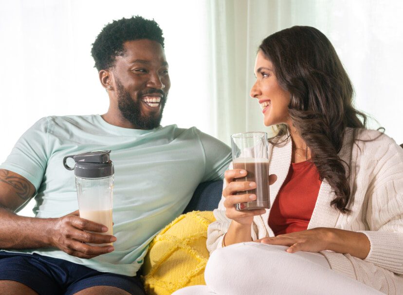 Man and women smiling at each other